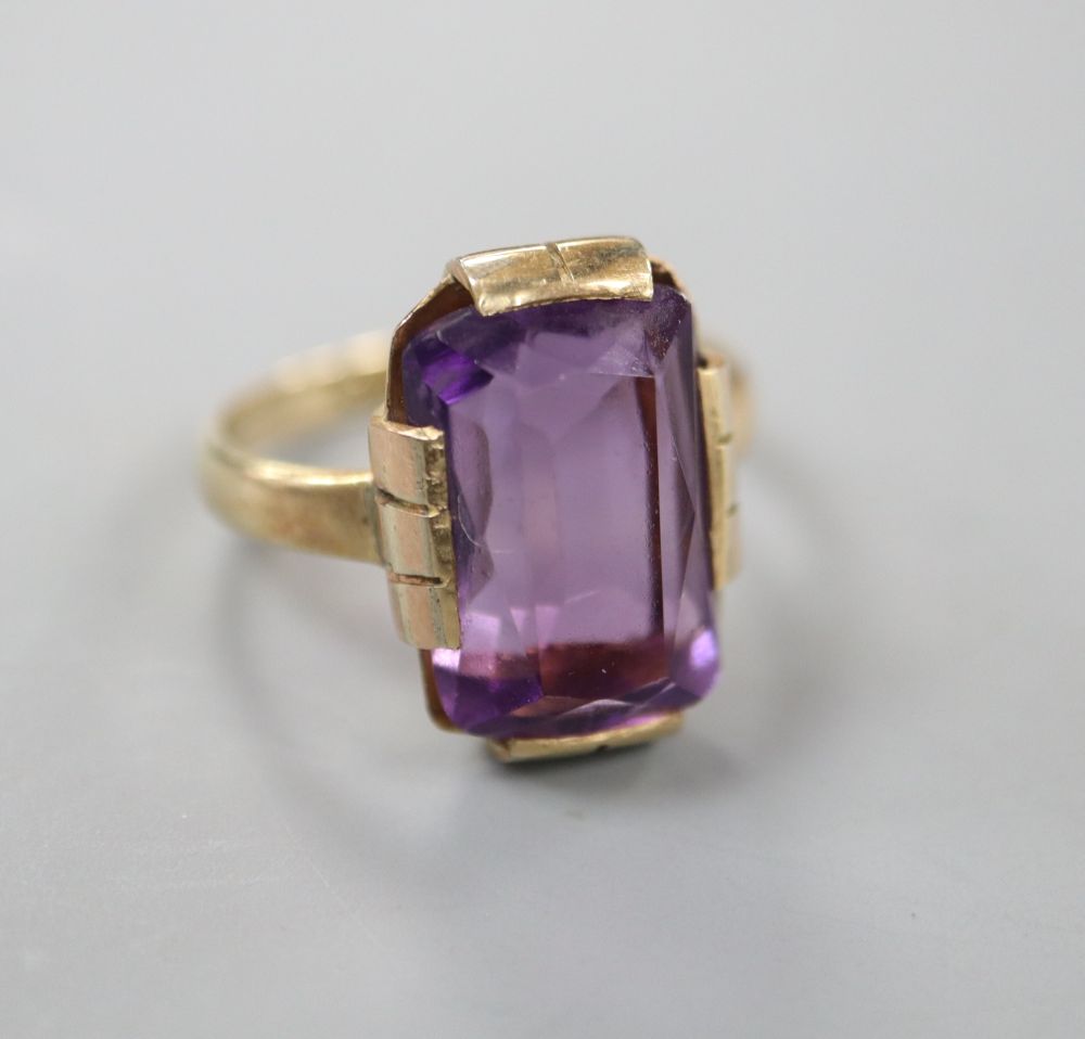 A 9ct gold and amethyst set dress ring, size K, gross 4.2 grams.